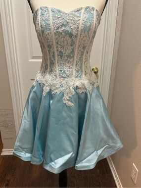 Camille La Vie Ice Blue strapless party dress with corset back.
